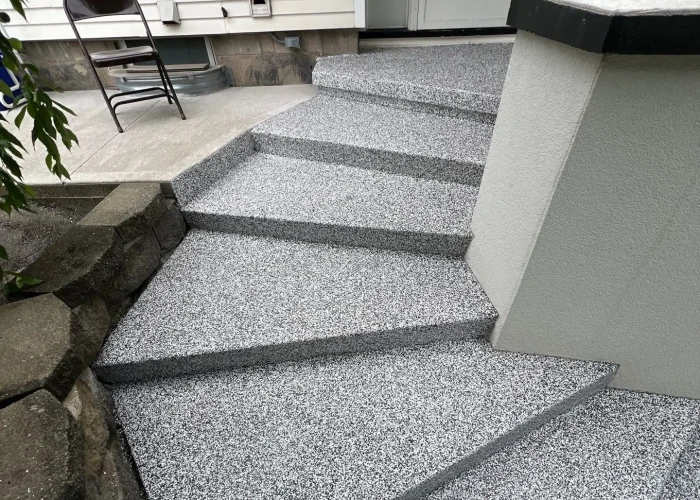 concrete-steps-before-rochester-ny-after After polyaspartic concrete coating on exterior steps Rochester NY garage floor company