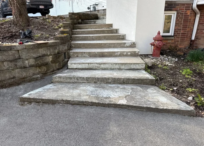 epoxy-step-coating-rochester-ny-before Before damaged concrete steps needing resurfacing in Henrietta and Brighton NY residential project