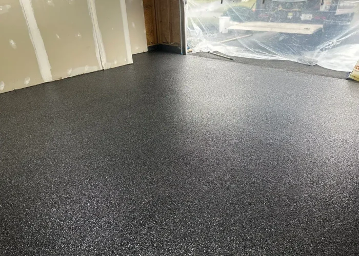 garage-floor-coating-north-chili-ny-after Finished polyaspartic garage floor coating system in Henrietta Pittsford and Victor NY residential garage